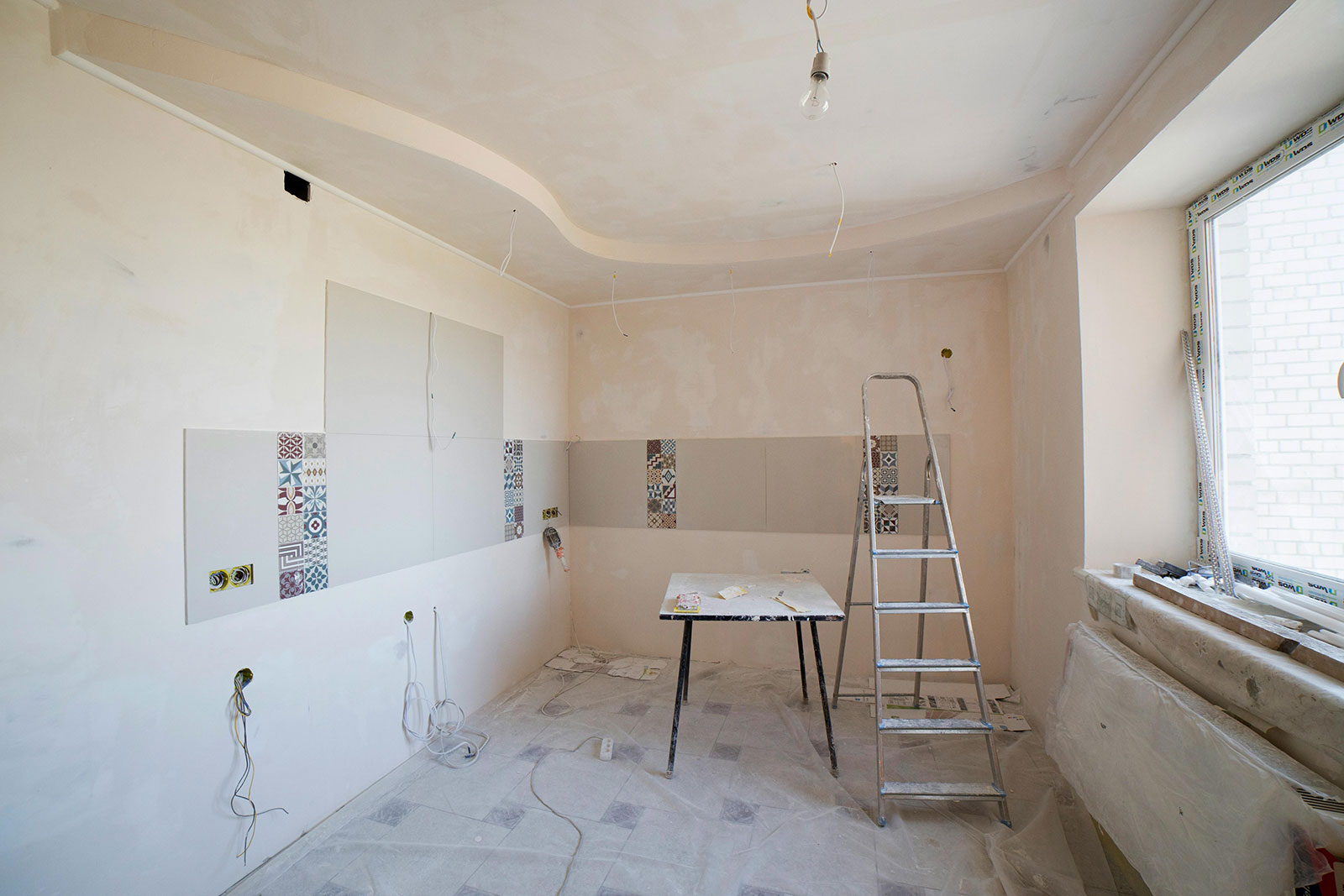 Kitchen renovation in progress with space for a modern hot water cylinder alternative installation
